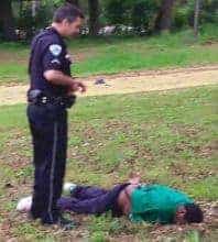 Scott lies face down at the feet of City Patrolman Michael Thomas Slager in North Charleston, S.C. Slager has been charged with murder. Photo: AP/Wide World photos