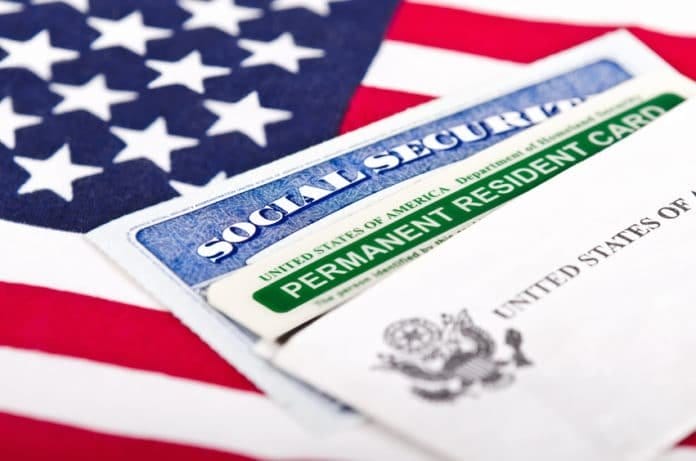 photo of social security card and flag