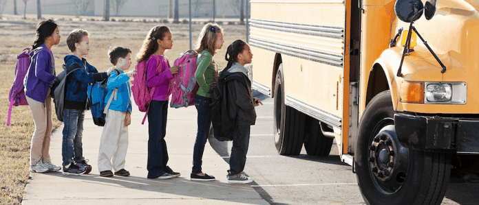 Children boarding school bus