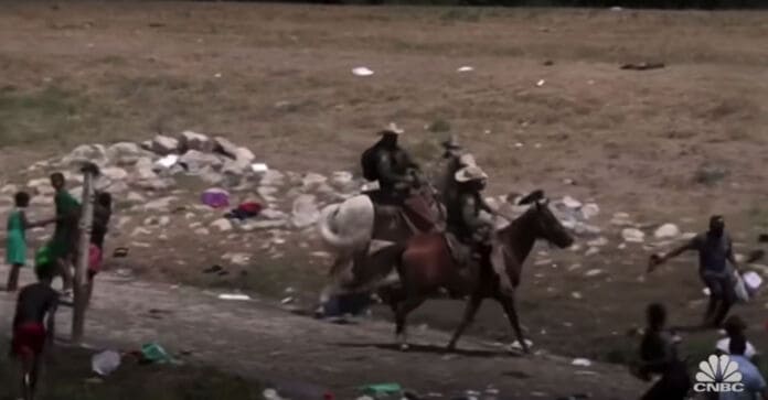 This is a photo of Haitian immigrants on horseback