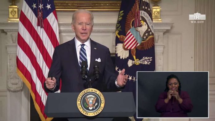 Photo of President Joe Biden speaking to reporters