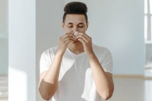ET-allergies Photo of person suffering form allergies
