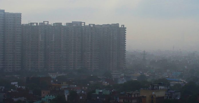 Photo of cityscape filled with smog
