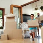 Photo of median income black family moving into new home