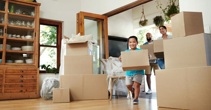 Photo of median income black family moving into new home