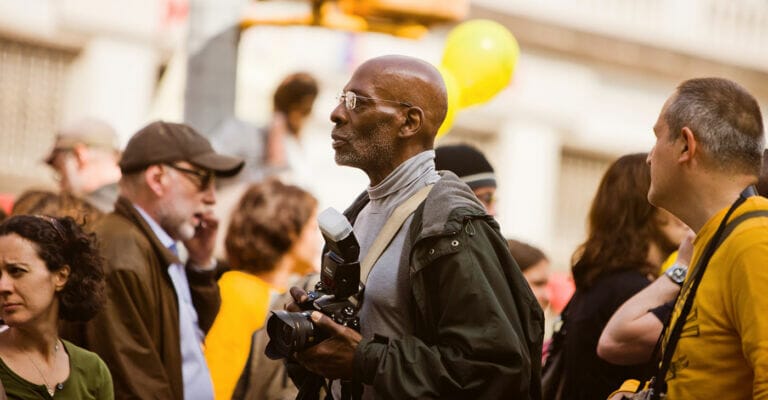 Image of photographer representing black media outlet