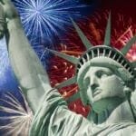Image of Lady Justice with fireworks in background