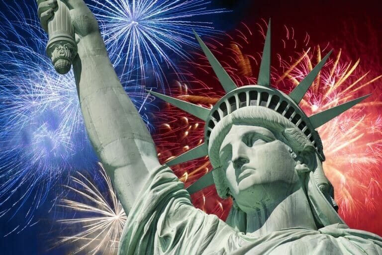 Image of Lady Justice with fireworks in background