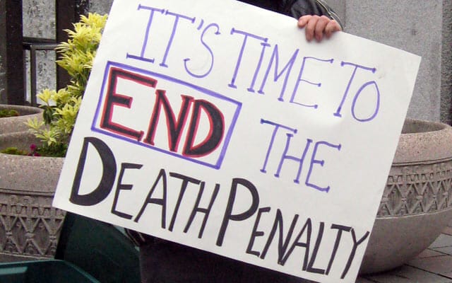 Death penalty protester with sign