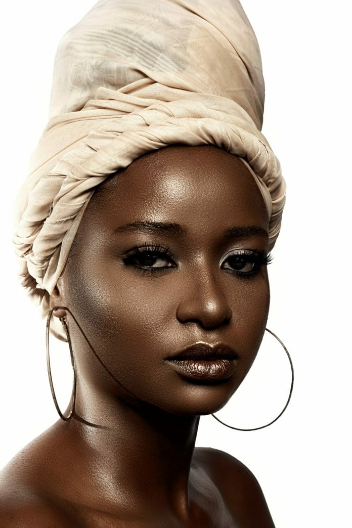 Black woman in white turban