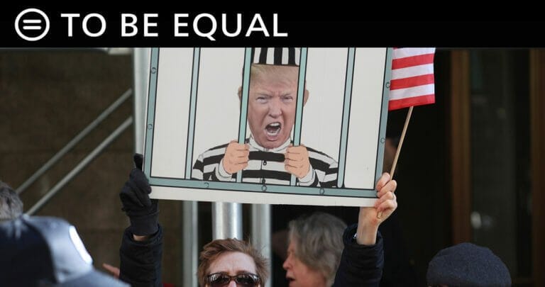 Image of Trump caricature in prison clothes behind bars