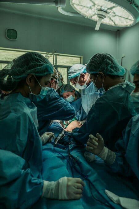 jc-gellidon-9Eb-bpTXglM-unsplash Doctors work on patient