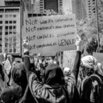 Photo of Palestinian protesters opposing Israeli war in West Bank