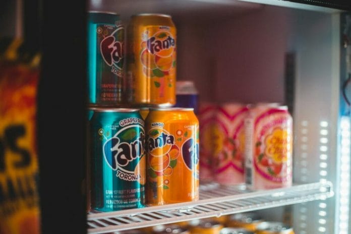Just two cans of soda a week is enough to undo the benefits of any exercise on cardiovascular disease, warns a new study. PHOTO BY ERIK MCLEAN/UNSPLASH 
